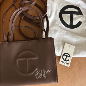 AUTOGRAPHED BY TELFAR CLEMENS 1 of 3 Telfar bag “I Love Me” Auction‘21 brown bag
